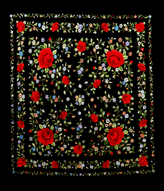 Mantón de seda natural bordado a mano. Fondo negro con bordado multicolor. Formato 135 × 135 cm. Un clásico con fuerza visual.