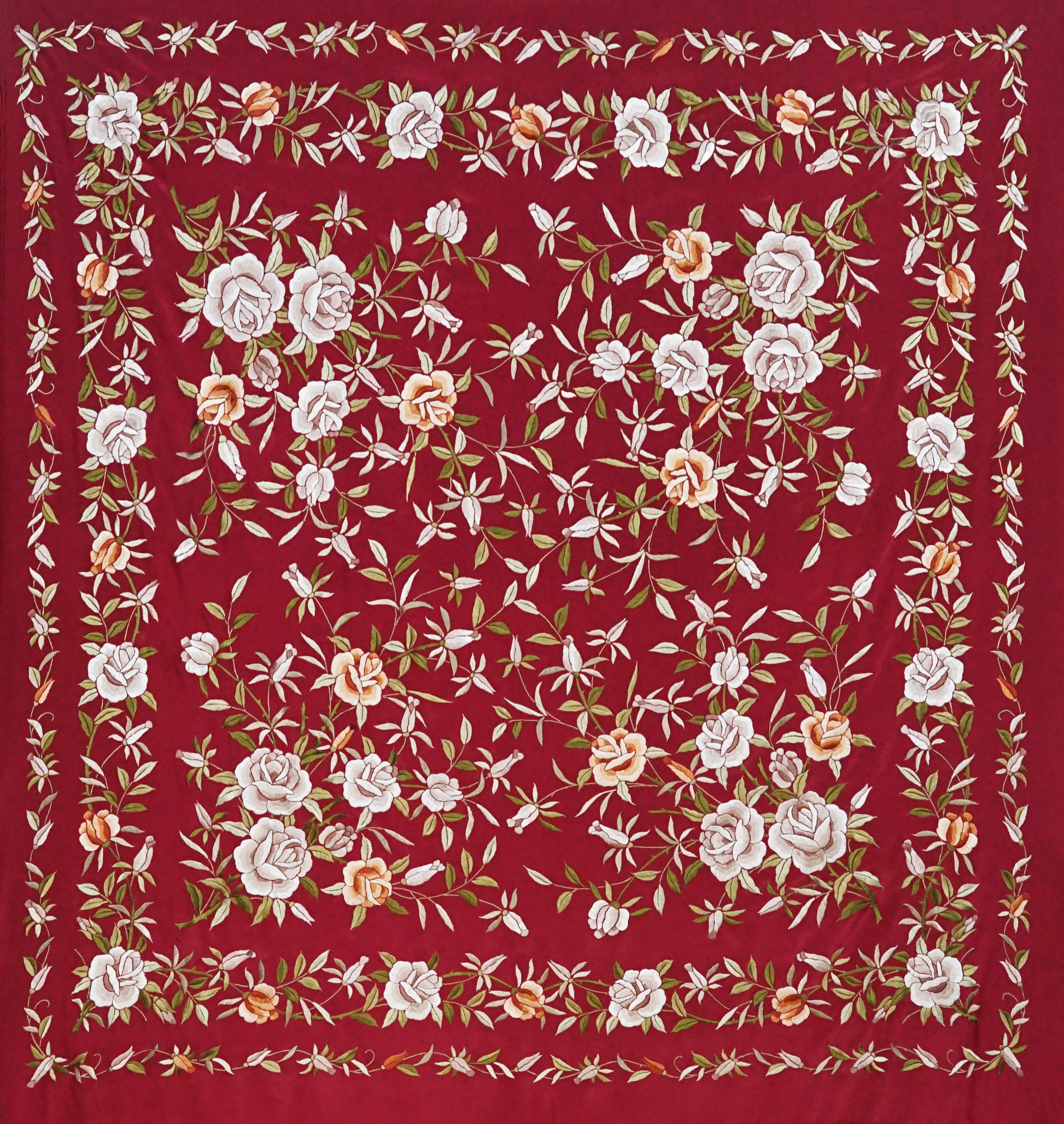 Mantón de seda natural bordado a mano. Pieza de 135 × 135 cm en seda burdeos con bordado multicolor. Intenso y sofisticado.