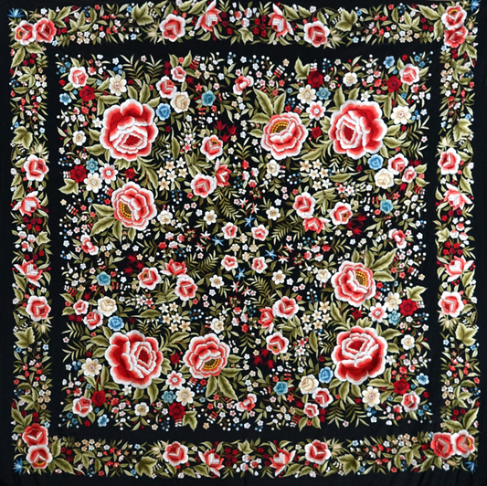 Mantón de seda natural bordado a mano. Artesanía en gran formato (150 × 150 cm) con fondo negro y bordado multicolor. Ideal para ocasiones especiales con un toque solemne y vibrante.